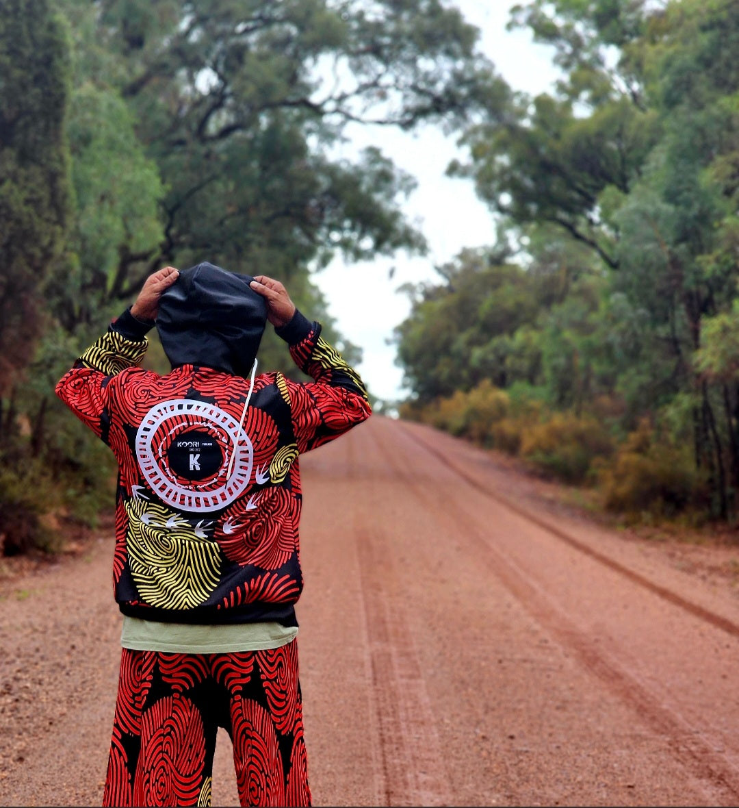 Changing The Narrative Snap Back Trackies by Koori Threads